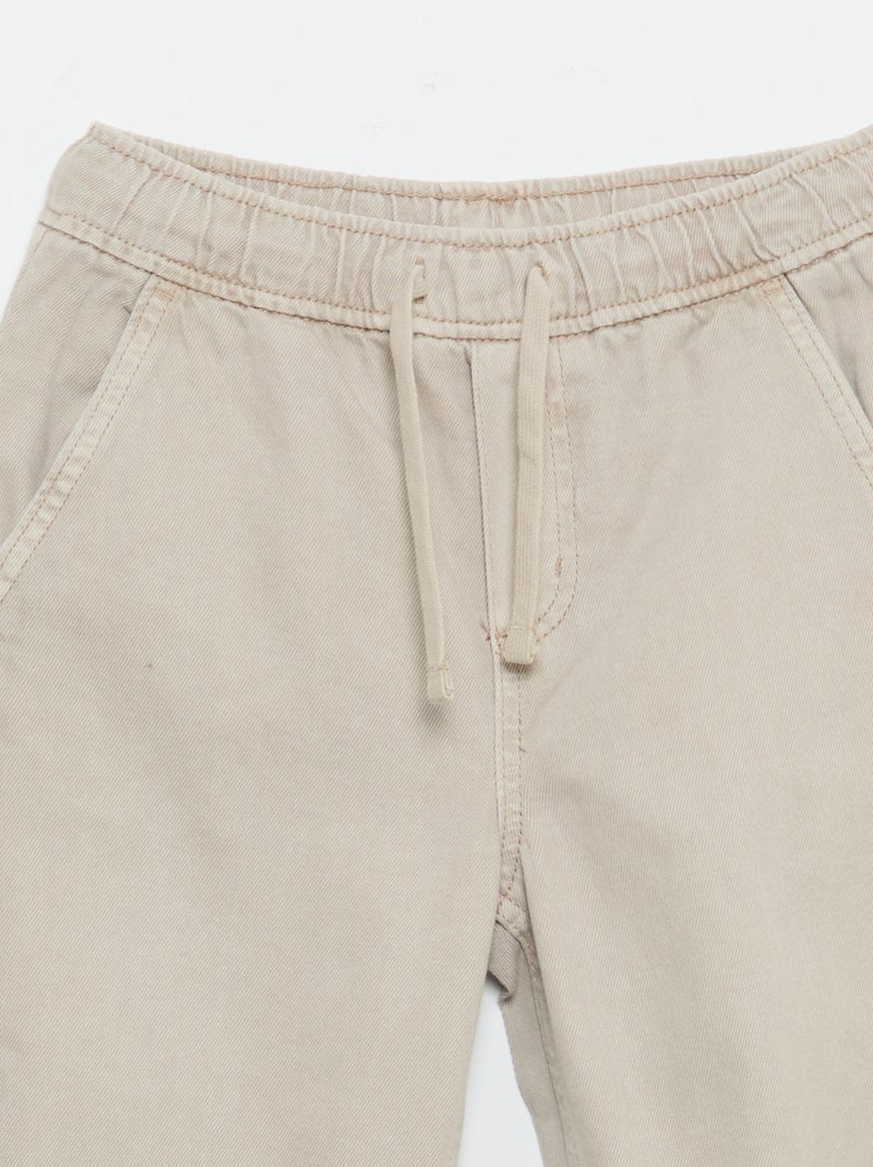 Pantalón de corte relajado con cintura elástica Beige - Kiabi