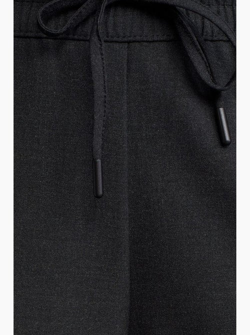 Pantalón de crepé de pernera ancha con cintura de cordón dilvin - Kiabi Pantalón de crepé de pernera ancha con cintura de cordón dilvin - Kiabi