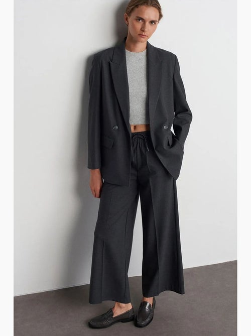Pantalón de crepé de pernera ancha con cintura de cordón dilvin - Kiabi Pantalón de crepé de pernera ancha con cintura de cordón dilvin - Kiabi