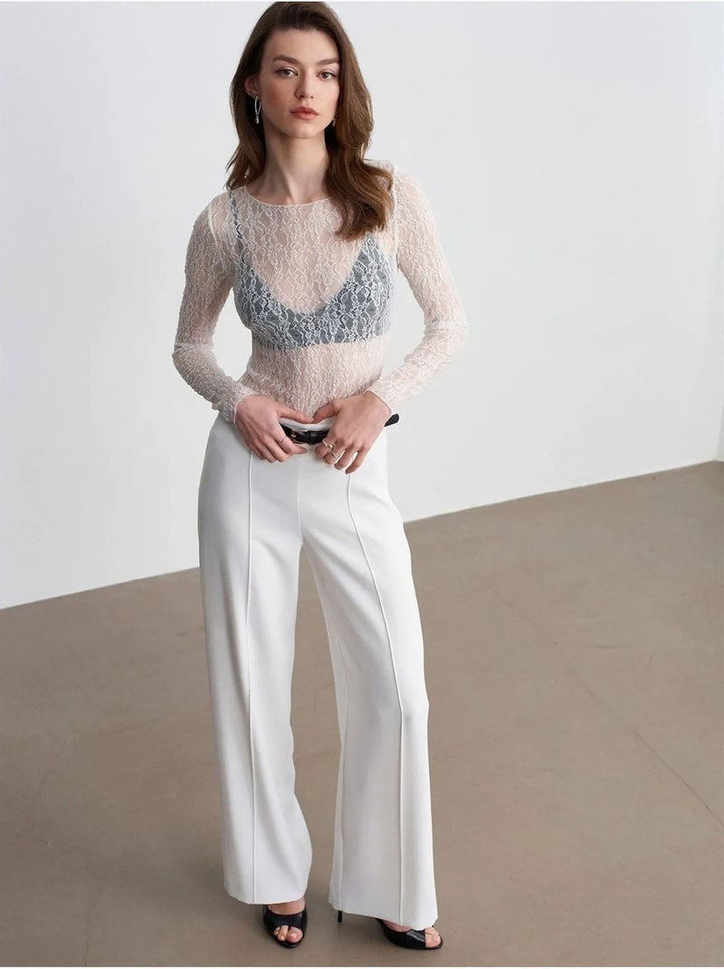 Pantalón de crepé de pernera ancha con cinturón Blanco roto - Kiabi