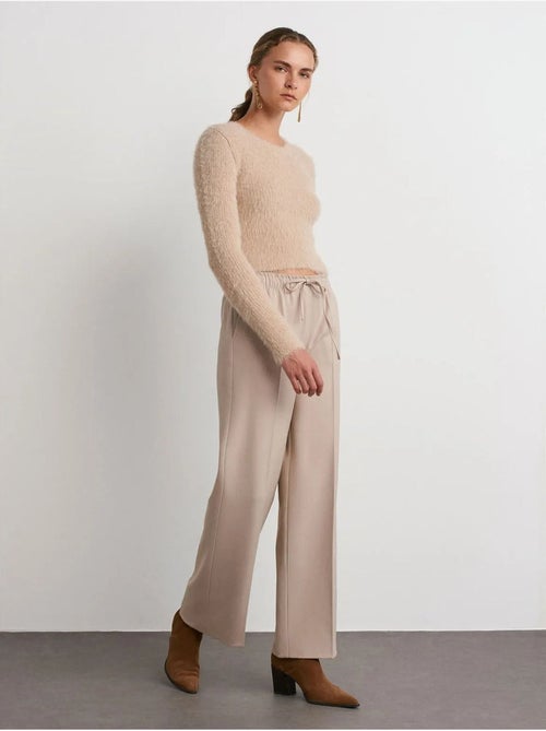 Pantalón de crepé de pernera ancha dilvin - Kiabi Pantalón de crepé de pernera ancha dilvin - Kiabi