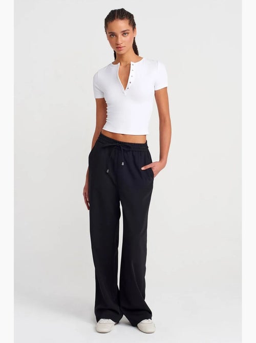 Pantalón de crepé de pernera ancha dilvin - Kiabi Pantalón de crepé de pernera ancha dilvin - Kiabi