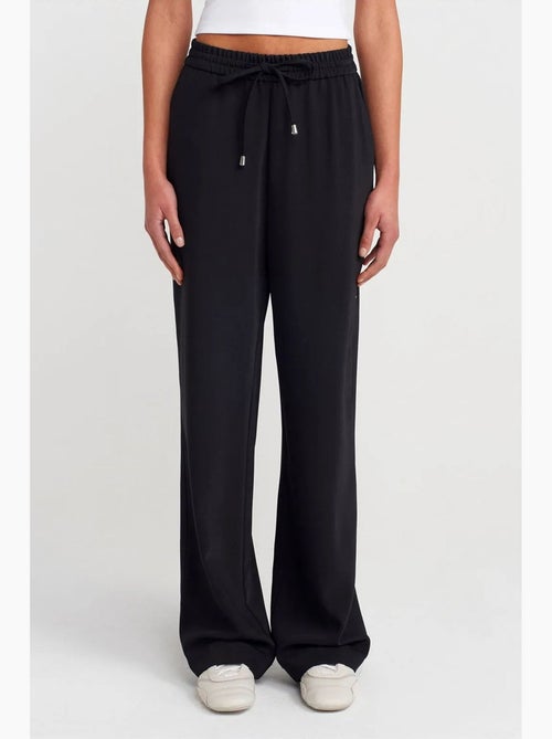 Pantalón de crepé de pernera ancha dilvin - Kiabi Pantalón de crepé de pernera ancha dilvin - Kiabi