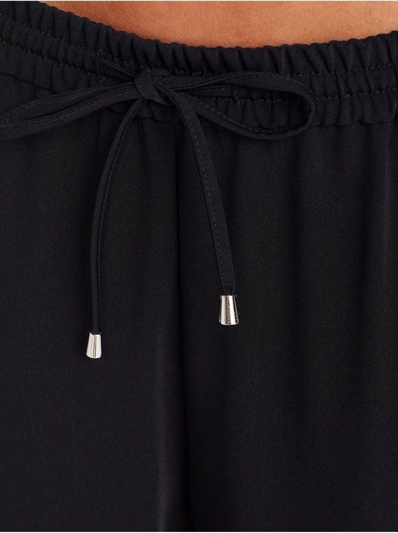 Pantalón de crepé de pernera ancha Negro - Kiabi