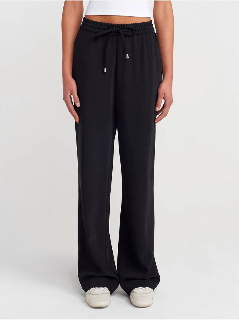 Pantalón de crepé de pernera ancha Negro - Kiabi