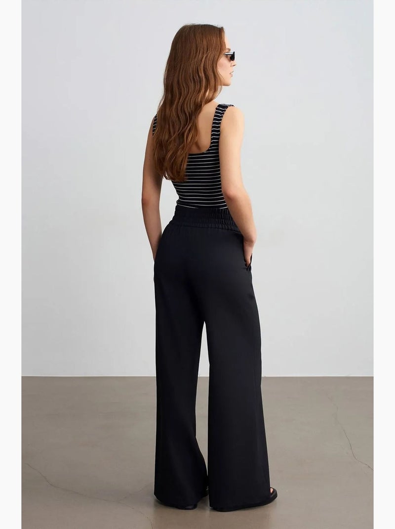 Pantalón de crepé de pernera ancha para mujer dilvin Negro - Kiabi
