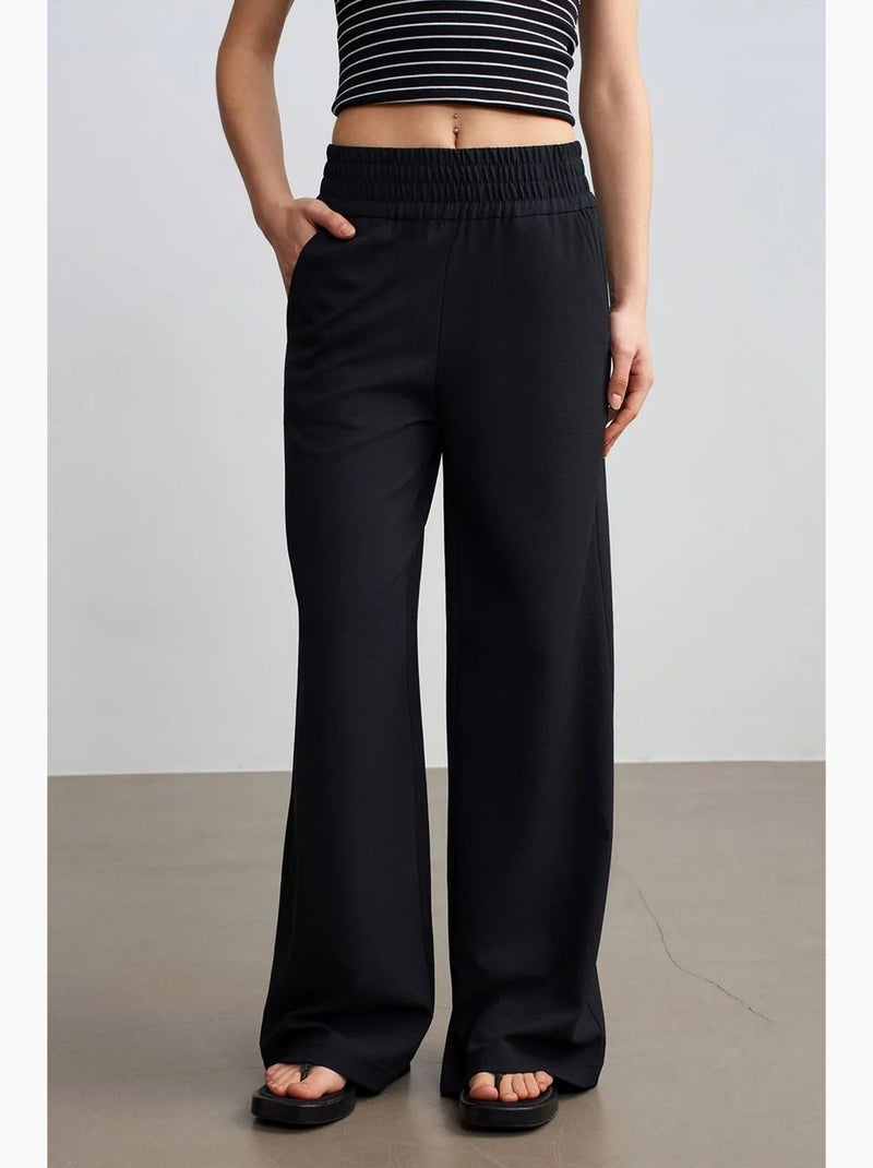 Pantalón de crepé de pernera ancha para mujer dilvin Negro - Kiabi