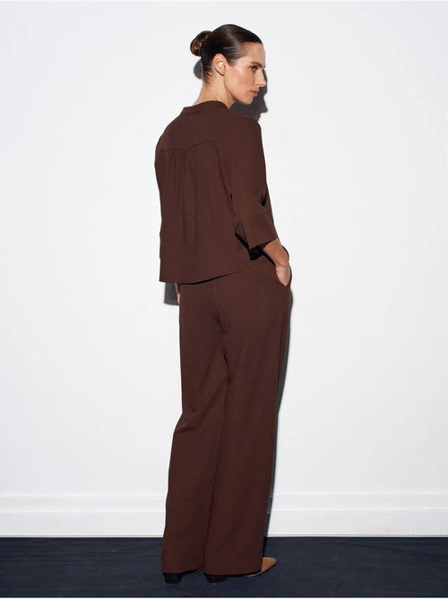 Pantalón de crepé de pernera ancha para mujer - Kiabi Pantalón de crepé de pernera ancha para mujer - Kiabi