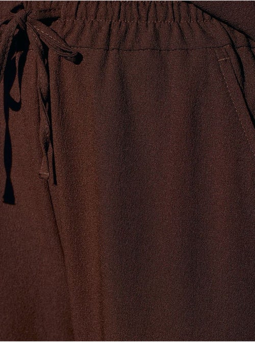 Pantalón de crepé de pernera ancha para mujer - Kiabi Pantalón de crepé de pernera ancha para mujer - Kiabi