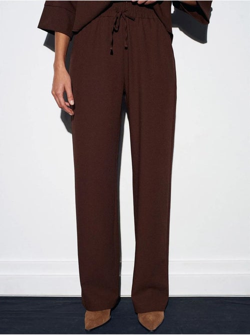 Pantalón de crepé de pernera ancha para mujer - Kiabi Pantalón de crepé de pernera ancha para mujer - Kiabi