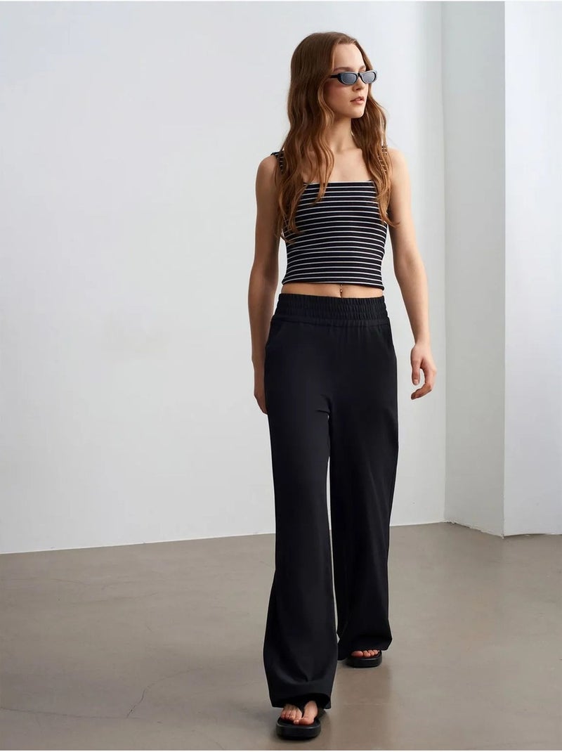 Pantalón de crepé de pernera ancha para mujer Negro - Kiabi