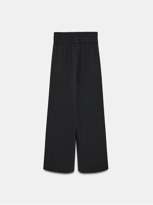 Pantalón de crepé de pernera ancha para mujer - Kiabi Pantalón de crepé de pernera ancha para mujer - Kiabi