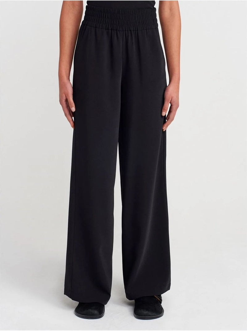 Pantalón de crepé de pernera ancha para mujer Negro - Kiabi