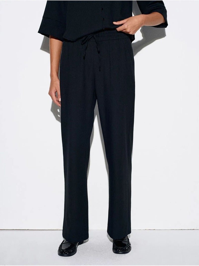 Pantalón de crepé de pernera ancha para mujer Negro - Kiabi