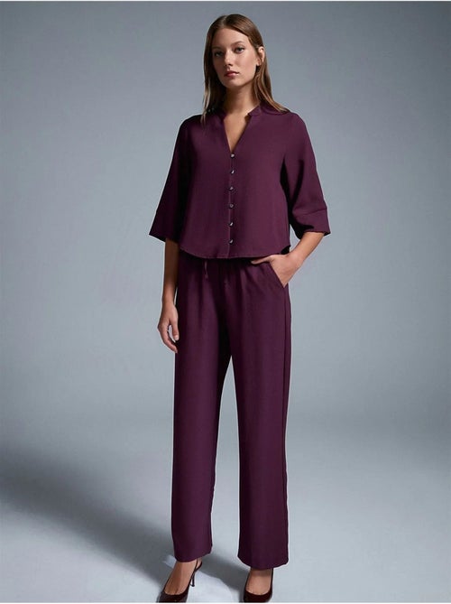 Pantalón de crepé de pernera ancha para mujer - Kiabi Pantalón de crepé de pernera ancha para mujer - Kiabi