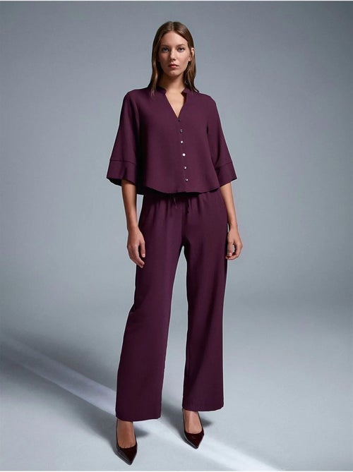 Pantalón de crepé de pernera ancha para mujer - Kiabi Pantalón de crepé de pernera ancha para mujer - Kiabi