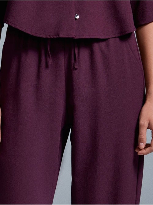 Pantalón de crepé de pernera ancha para mujer - Kiabi Pantalón de crepé de pernera ancha para mujer - Kiabi