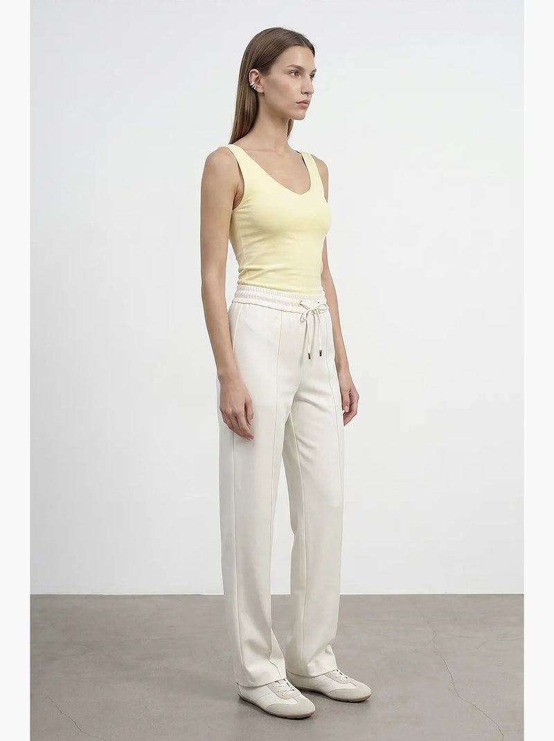 Pantalón de crepé de pernera recta con cintura de cordón ajustable dilvin Blanco roto - Kiabi