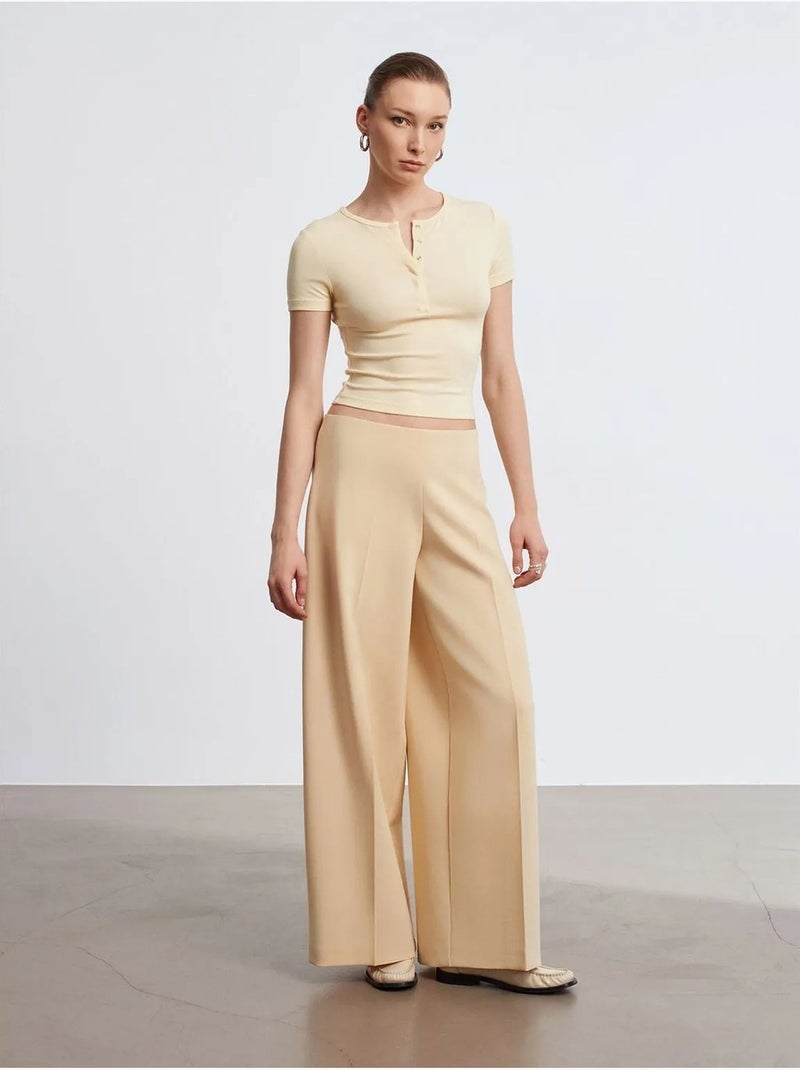 Pantalón de crepé de tiro alto y pernera ancha Beige - Kiabi