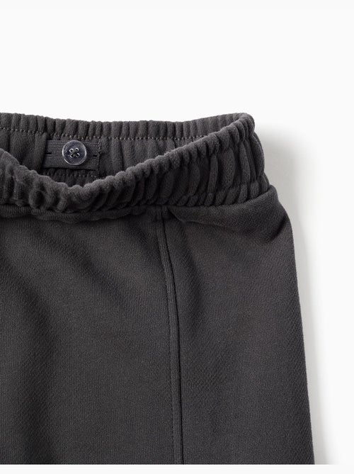 Pantalón de felpa de pierna ancha con bolsillos cargo - Kiabi Pantalón de felpa de pierna ancha con bolsillos cargo - Kiabi