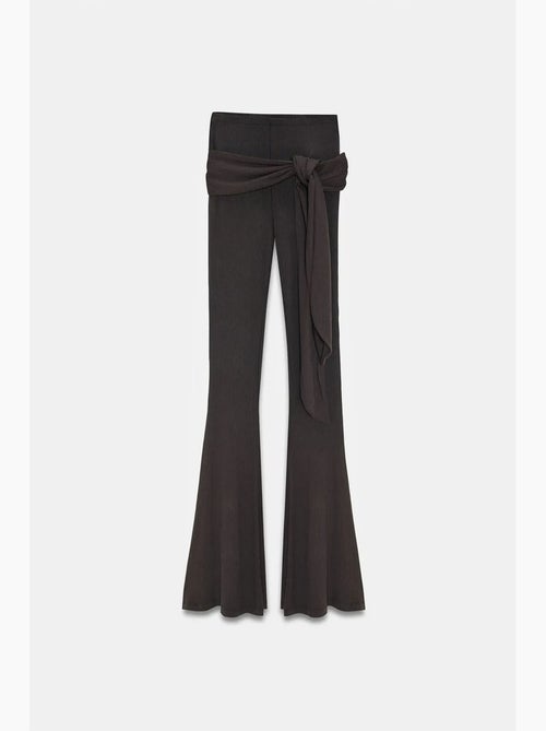 Pantalón de jersey acampanado de tiro alto con detalle de lazada dilvin - Kiabi Pantalón de jersey acampanado de tiro alto con detalle de lazada dilvin - Kiabi