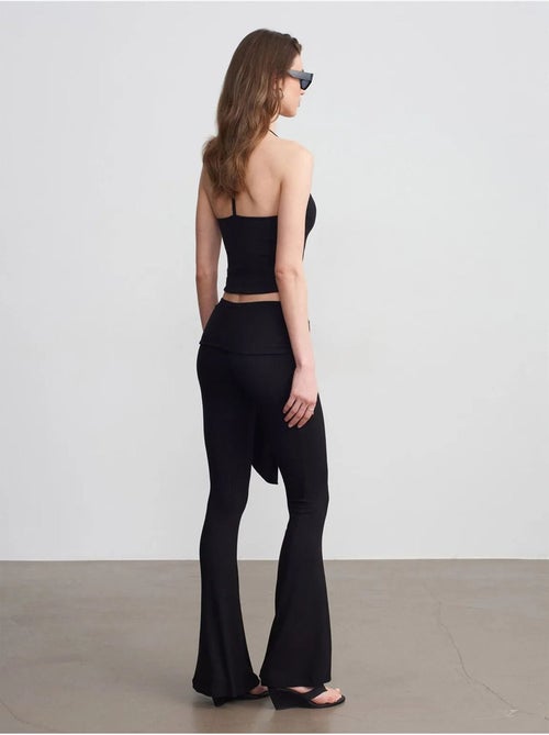 Pantalón de jersey acampanado de tiro alto con detalle de lazada dilvin - Kiabi Pantalón de jersey acampanado de tiro alto con detalle de lazada dilvin - Kiabi
