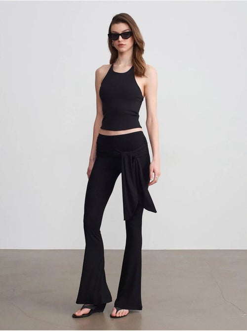 Pantalón de jersey acampanado de tiro alto con detalle de lazada dilvin - Kiabi Pantalón de jersey acampanado de tiro alto con detalle de lazada dilvin - Kiabi