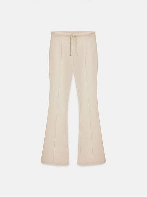 Pantalón de jersey acampanado de tiro medio con cordón dilvin - Kiabi Pantalón de jersey acampanado de tiro medio con cordón dilvin - Kiabi