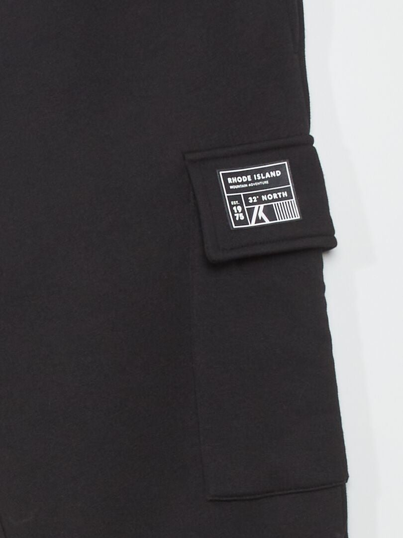 Pantalón de jogging con bolsillos con solapa NEGRO - Kiabi