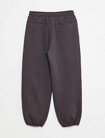 Pantalón de jogging con inscripción bordada