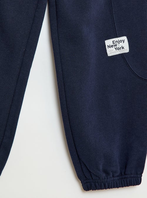 Pantalón de jogging deportivo en felpa ligera - Kiabi