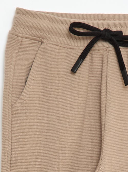 Pantalón de jogging liso en felpa ligera - Kiabi