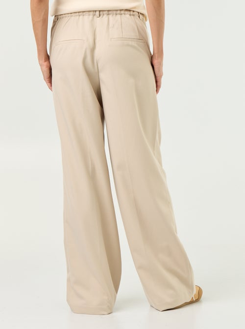 Pantalón de maternidad con pinzas - Kiabi Pantalón de maternidad con pinzas - Kiabi