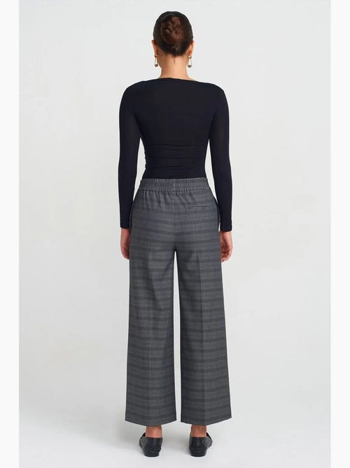 Pantalón de mujer de cuadros de pernera ancha y largo al tobillo dilvin - Kiabi Pantalón de mujer de cuadros de pernera ancha y largo al tobillo dilvin - Kiabi