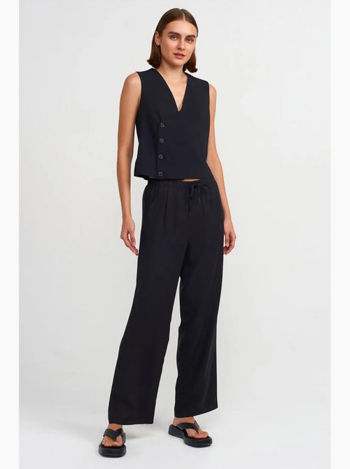 Pantalón de mujer de tencel de pernera ancha con cintura con cordón dilvin - Kiabi Pantalón de mujer de tencel de pernera ancha con cintura con cordón dilvin - Kiabi