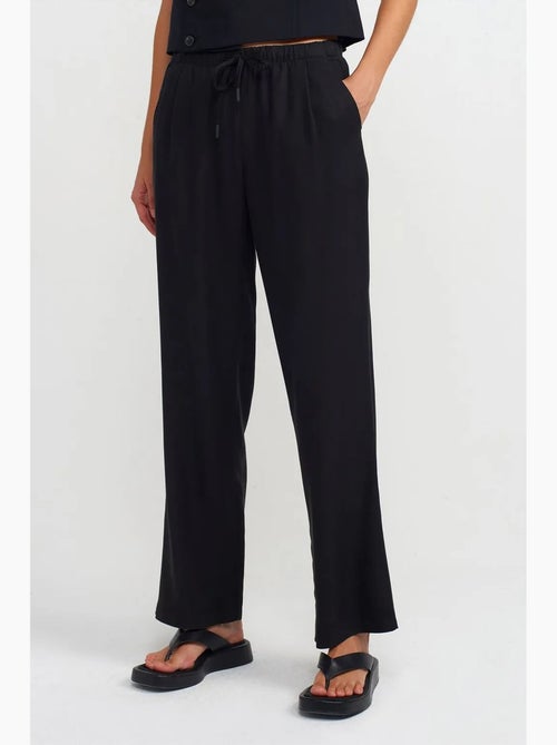 Pantalón de mujer de tencel de pernera ancha con cintura con cordón dilvin - Kiabi Pantalón de mujer de tencel de pernera ancha con cintura con cordón dilvin - Kiabi