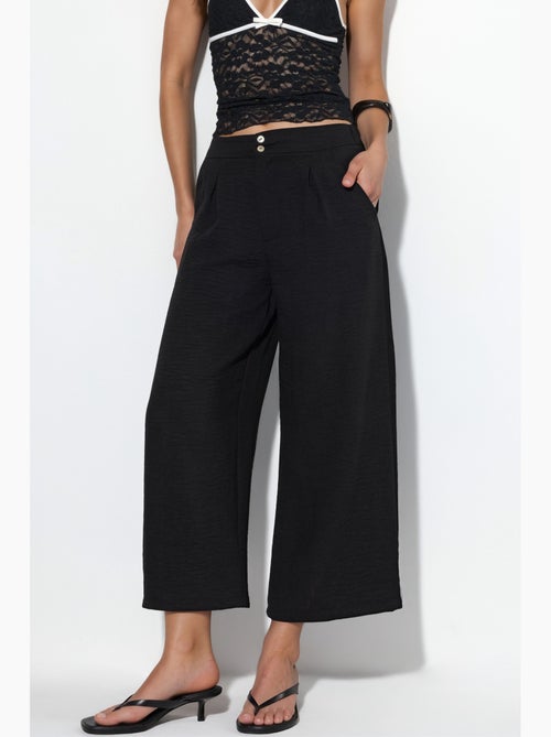 Pantalón de mujer de tiro alto y pernera ancha busem - Kiabi Pantalón de mujer de tiro alto y pernera ancha busem - Kiabi