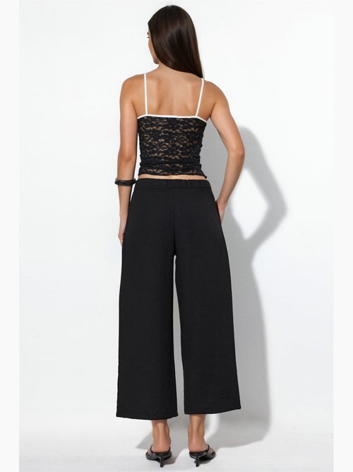 Pantalón de mujer de tiro alto y pernera ancha busem - Kiabi Pantalón de mujer de tiro alto y pernera ancha busem - Kiabi