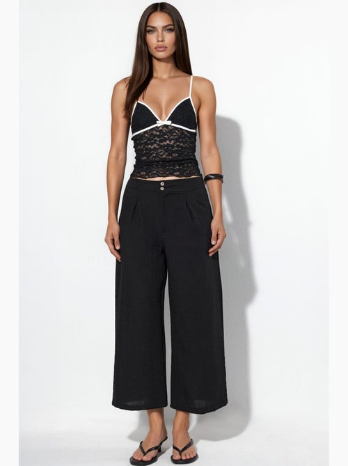 Pantalón de mujer de tiro alto y pernera ancha busem - Kiabi Pantalón de mujer de tiro alto y pernera ancha busem - Kiabi