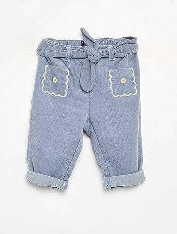 Pantalón de pana con bolsillos bordados