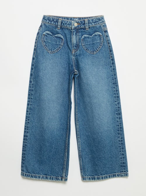 Pantalón de pernera ancha con bordados de corazones - Kiabi Pantalón de pernera ancha con bordados de corazones - Kiabi