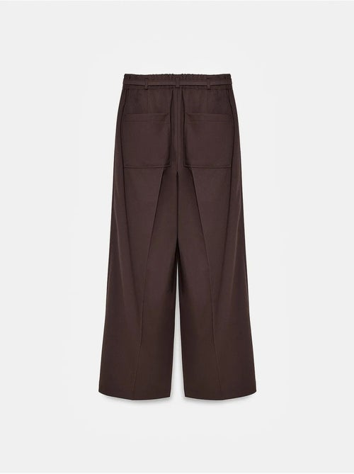 Pantalón de pernera ancha con cinturón dilvin - Kiabi Pantalón de pernera ancha con cinturón dilvin - Kiabi