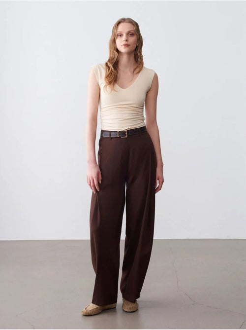 Pantalón de pernera ancha con pliegues - Kiabi Pantalón de pernera ancha con pliegues - Kiabi