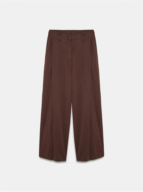 Pantalón de pernera ancha con pliegues - Kiabi Pantalón de pernera ancha con pliegues - Kiabi