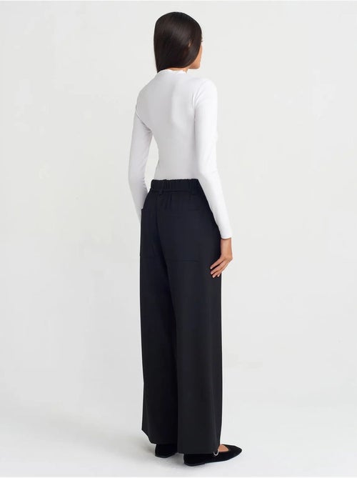 Pantalón de pernera ancha de tejido con cintura elástica y cordón ajustable dilvin - Kiabi Pantalón de pernera ancha de tejido con cintura elástica y cordón ajustable dilvin - Kiabi