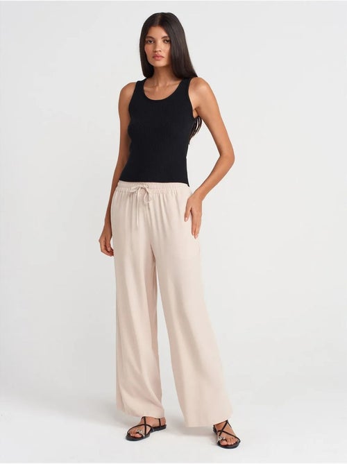 Pantalón de pernera ancha de tencel con cintura con cordón dilvin - Kiabi Pantalón de pernera ancha de tencel con cintura con cordón dilvin - Kiabi