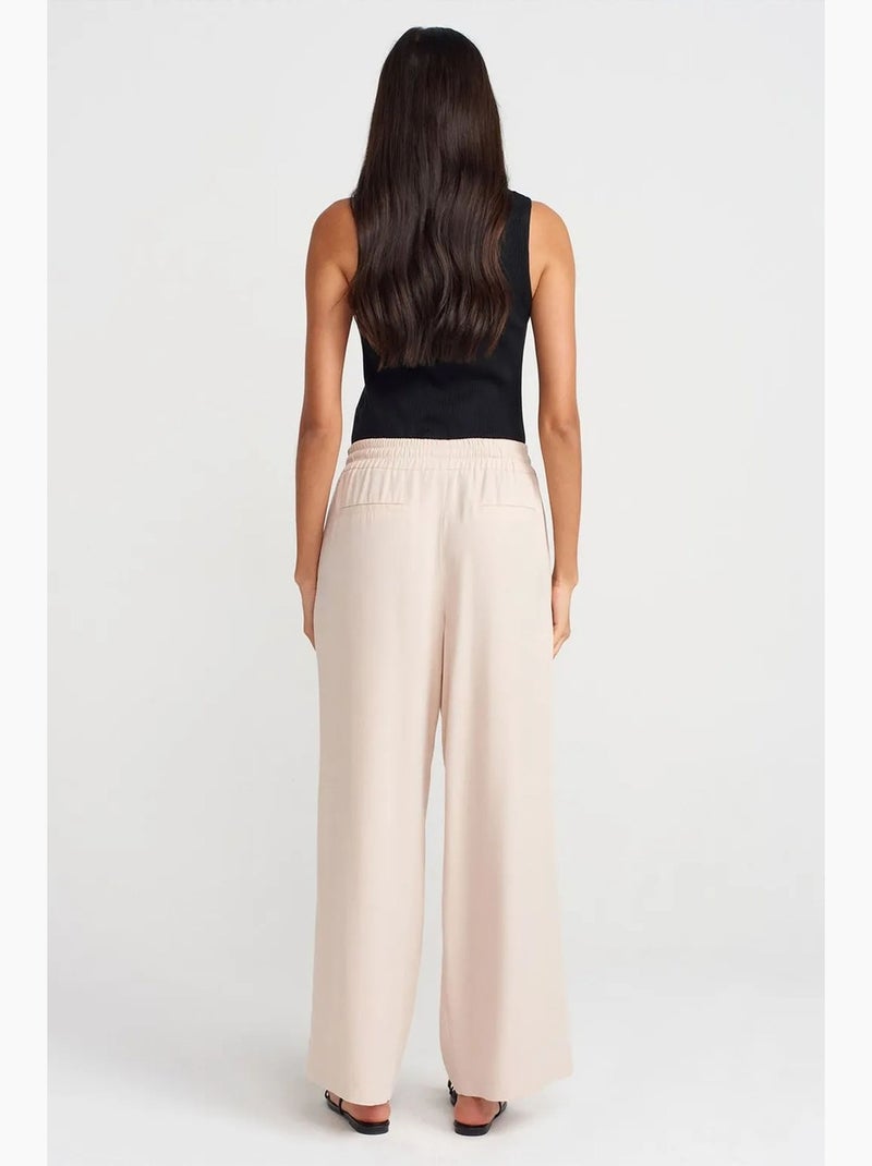 Pantalón de pernera ancha de tencel con cintura con cordón dilvin Crema - Kiabi