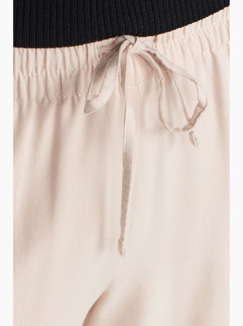 Pantalón de pernera ancha de tencel con cintura con cordón dilvin - Kiabi Pantalón de pernera ancha de tencel con cintura con cordón dilvin - Kiabi