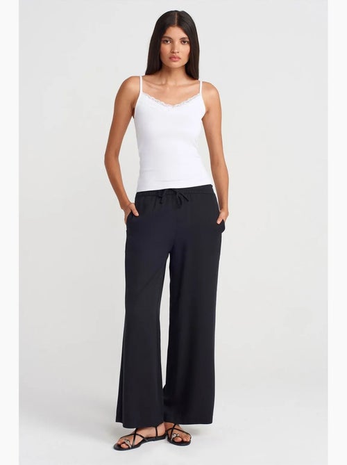 Pantalón de pernera ancha de tencel con cintura con cordón dilvin - Kiabi Pantalón de pernera ancha de tencel con cintura con cordón dilvin - Kiabi