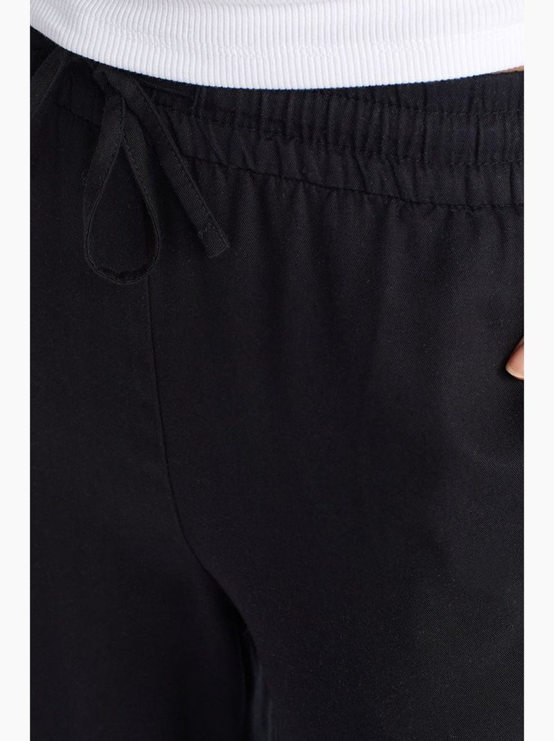 Pantalón de pernera ancha de tencel con cintura con cordón dilvin Negro - Kiabi